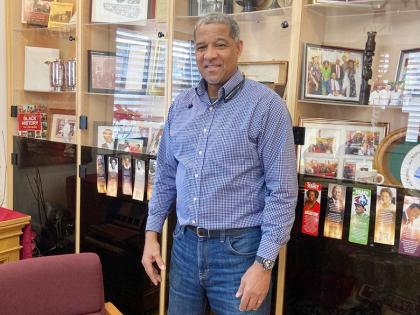 Rev Dr Wendell Gibbs, senior pastor of First Baptist Church Toronto, standing in the Penny Hodge Heritage Room.