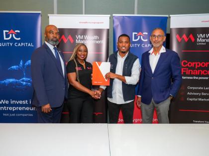 From left: VM Wealth Deputy CEO Brian Frazer; VM Wealth Chief Operating Officer,Allison Mais; Dequity CEO and founder Kadeen Mairs; and Chairman of Dequity Dr Damien King, pose with the new agreement signed between Dequity Capital Management Limited and VM