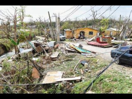 This photo shows remains of board houses in Retirement, Bluefields, Westmoreland, which were destroyed by Hurricane Melissa on October 28, 2025. 
