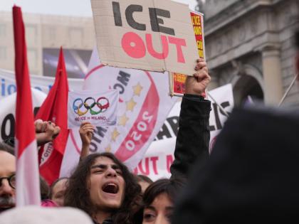 
A person holds a sign, during an anti-ICE demonstration, ahead of the 2026 Winter Olympics, in Milan, Italy, yesterday.