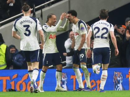 Tottenham’s Dominic Solanke (19) is congratulated after scoring his side’s second  goal during the English Premier League match between Tottenham Hotspur and Manchester City in London yesterday.