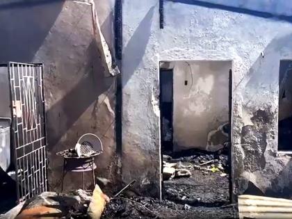 The elderly siblings’ home after the blaze.