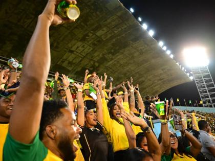 A crowd inside the Grand Stand at the National Stadium.