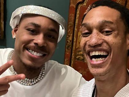 Romaine Dixon (right) and Minnesota Vikings Wide Receiver Justin Jefferson. 