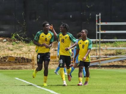  Jamaica Under-17’s Kelvin D Brown (left) celebrates after scoring a goal against Aruba with teammates Jude Royes (centre)  and Jaheem Bennett during their Concacaf U17 Qualifier at the Costa Rica Football Federation field on Friday, February 6.
