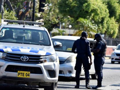In this file photo JCF personnel are seen checking documents during a spot check.