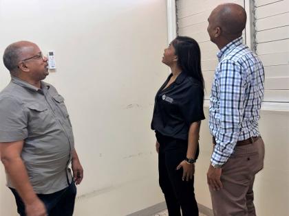 Christopher Ffrench (left), medical officer in Accident & Emergency at Kingston Public Hospital; Jhana Edwards, marketing manager at Supreme Ventures Limited; and Igol Allen, blood donor organiser, discuss the impact of the newly donated air conditioning u