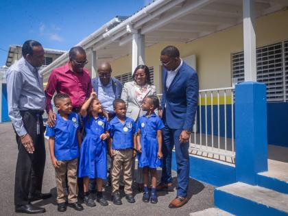From left: CEO of the Culture, Health, Arts, Sports and Education (CHASE) Fund, W. Billy Heaven; Mayor of May Pen Joel Williams; Chairman of the May Pen Infant School in Clarendon, Carlton Knight; Principal of the school, Kim-Cay Brown; and Chairman of the