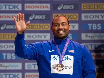 The United States’ Curtis Thompson celebrates the bronze medal he won at the World Athletics Championships in Tokyo, Japan last year.