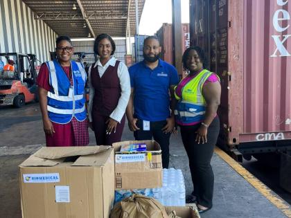 The Biomedical Caledonia Laboratory team recently made a donation to charity organization, Food For The Poor (FFP) in support of the Hurricane Melissa relief efforts. Here, Marsha Burrell Rose (left), FFP’s development & marketing manager accepts the don