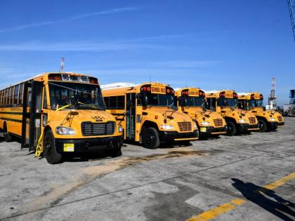 This 2025 photo shows some of the buses procured by the Government for the rural school bus system. 
