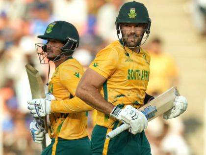 South Africa’ captain Aiden Markram, right, and batting partner Quinton de Kock run between the wickets during the T20 World Cup cricket match between South Africa and West Indies in Ahmedabad, India, Thursday, February 26, 2026. 