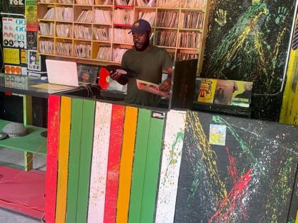 Ainsworth ‘Mitchie’ Williams at Mitchie’s Record Shop, 136D Orange Street, downtown Kingston.