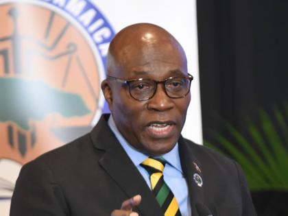Chief Justice Bryan Sykes making a presentation during ‘A Conversation with the Judiciary’ at The Summit Hotel in New Kingston on Thursday.