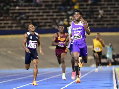 Tahj Marques White of Kingston College leads his school to victory in the high school boys 4x400m Open at last year’s Gibson McCook Relays.