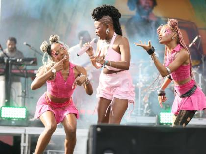 Joby Jay performs with backup dancers on the Foundation Stage on Day 1 of the Lost in Time music festival at the Hope Botanical Gardens in St Andrew. 