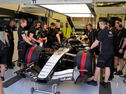 
Mechanics of Cadillac driver Valtteri Bottas of Finland prepare his car during a Formula One pre-season test at the Bahrain International Circuit in Sakhir, Bahrain.