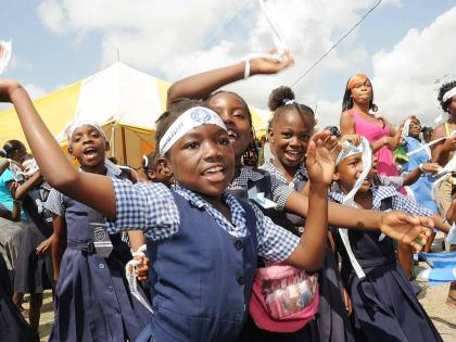 Students of Homestead Primary School in Spanish Town, St Catheriine take part in a Peace and Love in Society Peace Day concert at the school.