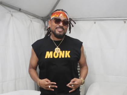 Machel Montano poses for photos backstage at I Love Soca.