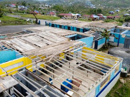This photo shows damaged roof of Darliston Primary School destroyed by Hurricane Melissa last October.