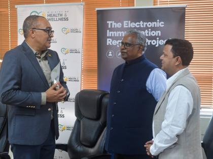 Minister of Health and Wellness, Dr Hon. Christopher Tufton (left), converses with Managing Director of ArguSoft America Incorporated, Ram Gopalan (centre), and President of Professional Services at Argusoft America Incorporated, Ravi Shankar, following th