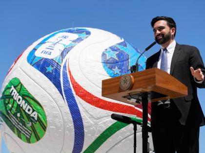 New York City Mayor Zohran Mamdani speaks in front of a large football ball during a news conference in the Staten Island borough of New York, Monday, April 27, 2026. (AP Photo/Seth Wenig)