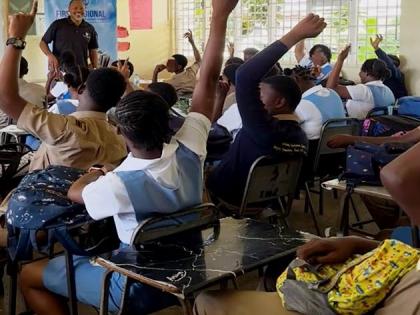 Deslon Brown, business development manager, First Regional Co-op Credit Union Ltd, presenting on financial literacy to grade-nine students at Iona High School in Tower Isle, St Mary, on Tuesday, April 21.