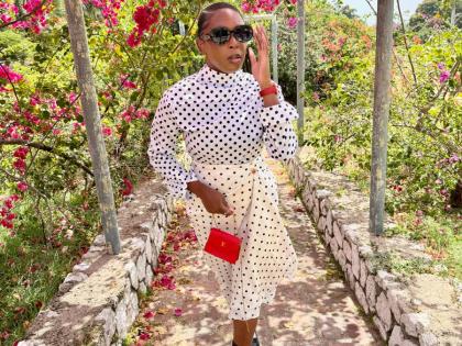McLeggon puts her own spin on classic polka dots with a FiercebyDre top, Tajie’s Trendy Fashion skirt and loafers from Heel-O.