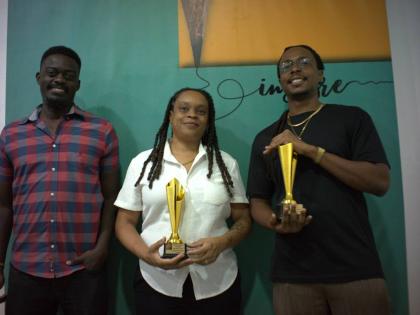 Dr Brian Kazzara, consultant psychiatrist at Bellevue Hospital, shares a moment with Lesley-Ann Wanliss, director of Bright Sparks and recipient of the Emerging Filmmaker Award, and Jordan Morris, director of Smile and winner of the Lens of Legacy Award. T