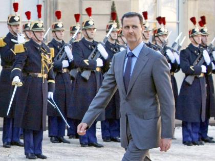 Syria President Bashar al-Assad arrives at the Elysee Palace in Paris on December 9, 2010.