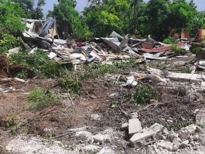 Approximately 20 predominantly concrete houses reduced to rubble by bulldozers, tractors and sledgehammers in Cooper’s Pen, Trelawny, last Tuesday.