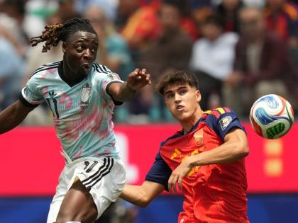 Belgium’s Jeremy Doku (left) and Spain’s Pau Cubarsi vie for the ball during the World Cup quarterfinal match between Spain and Belgium in Inglewood, California, Friday, July 10, 2026. 