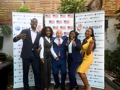 US Embassy Public Affairs Attaché Mike Lavallee (centre) celebrates with the 2026 Fulbright awardees (from left) Abishua Johnson, Davia Findlotor, Joelle Hanson, and Jervian Johnson.