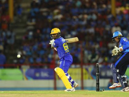 Barbados Tridents’ Sherfane Rutherford (left) plays square of the wicket during a Republic Bank Caribbean Premier League cricket game against the St Lucia Kings on Sunday. St Lucia Kings wicketkeeper, Jewel Andrew, looks on.  