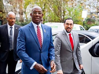 Former prime ministers of Trinidad and Tobago Dr Keith Rowley (centre) and Stuart Young (right).