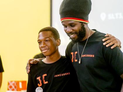 El-Nathan Pitkin shares a moment with Chronixx, co-founder and conceptualiser of the JamCoders programme.