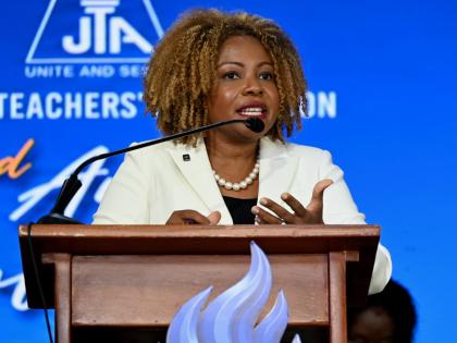 Dr Dana Morris-Dixon, minister of education, skills, youth and information, addresses the delegates at the third and final day of the Jamaica Teachers’ Association’s 62nd annual conference at the Ocean Coral Spring Hotel in Trelawny yesterday.