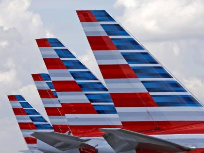 American Airlines passenger planes are parked at Miami International Airport in Miami, Florida, on July 17, 2015.