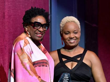 Journalist Janet Silvera receives the inaugural First Dance Studios FLAME Award from founder and artistic director Jody-Marie Smith during the National Dance Theatre Company’s 64th Season of Dance finale in Montego Bay on Sunday.