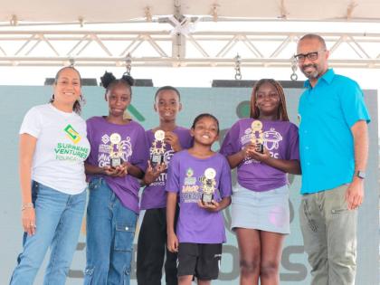 The top four campers at the Supreme Ventures Foundation (SVF) Junior Creators Robotics Camp celebrate their SVF Robotics Scholarship wins. Pictured with Heather Goldson (left), executive director of the Supreme Ventures Foundation, are (from second left) K
