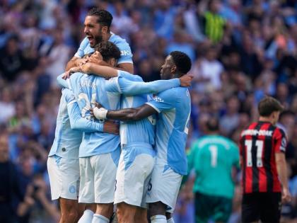 Manchester City’s players celebrate after Josko Gvardiol  scored his side’s second goal during the English Premier League match between Manchester City and Bournemouth in Manchester, England yesterday.