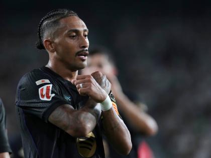 Barcelona’s Raphinha celebrates after scoring his side’s third goal during a Spanish La Liga football  match between Elche and Barcelona in Elche, Spain, yesterday.