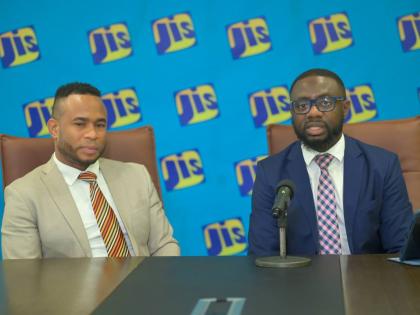 Manager of Debt Recovery Unit in the Client Relationship Management Services department at the Students’ Loan Bureau, Owin Watson (left); and Debt Recovery Unit Supervisor at the Students’ Loan Bureau, Corneilus Hylton.