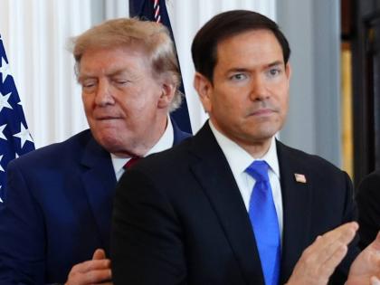 President Donald Trump walks past Secretary of State Marco Rubio as he arrives for a roundtable on the American mining industry on August 7 at the State Department in Washington. 