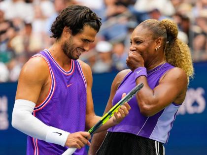 Carlos Alcaraz, of Spain (left) and Serena Williams, of the United States, talk on the court during a mixed doubles match at the US Open tennis championships, yesterday, in New York. 