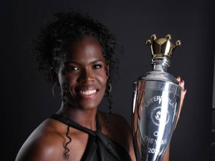 Khadijah Saw celebrates with her PFA Award.