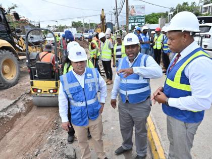 Matthew Samuda (left), minister of water, environment and climate change; Kevin Kerr (right), president of the National Water Commission (NWC); and Gary Walters (centre), senior project manager, take part in a tour on Tuesday of the pipeline project curren