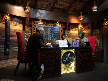 A contestant competes on a game show called Masoyinbo, which translates to ‘Do not speak English,’ in Lagos, Nigeria.