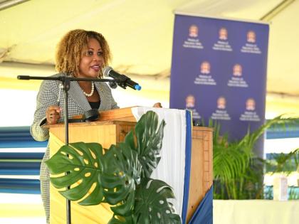 Minister of Education, Skills, Youth and Information, Senator Dr. the Dana Morris Dixon, delivers the keynote address at the official launch ceremony of Hydel Cumberland High School yesterday at the Cumberland campus in Portmore, St Catherine.
