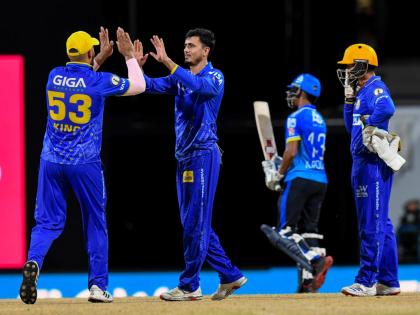 Thee Barbados Tridents’ Brandon King (left), Mujeeb ur Rahman (centre), and Tim Seifert (right) celebrate the wicket of St Lucia Kings opener Kamil Pooran during their Republic Bank Caribbean Premier League game at the Kensington Oval on Sunday.